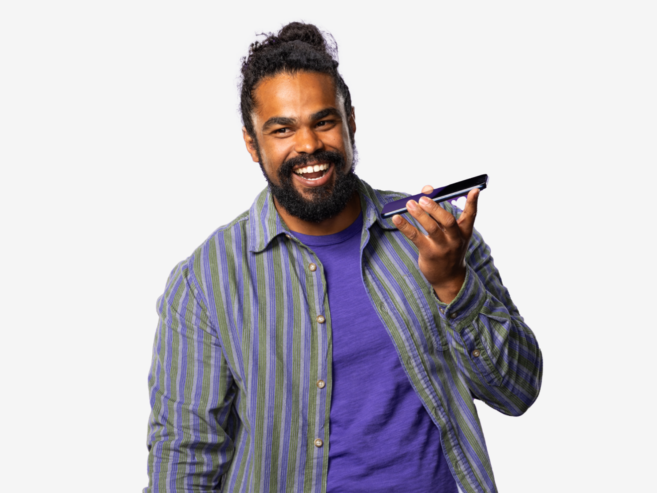 Person smiling while talking on the phone.